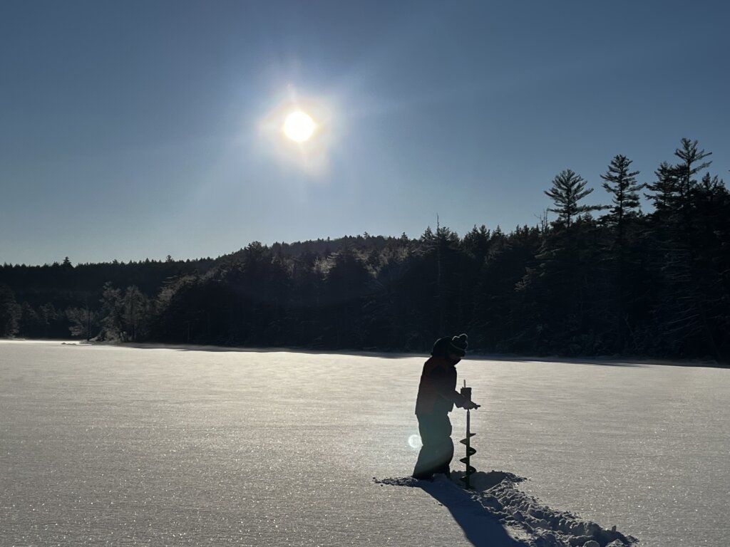 Sunshine and icefishing Maine